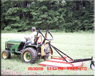 mowing a plot with the bushhog